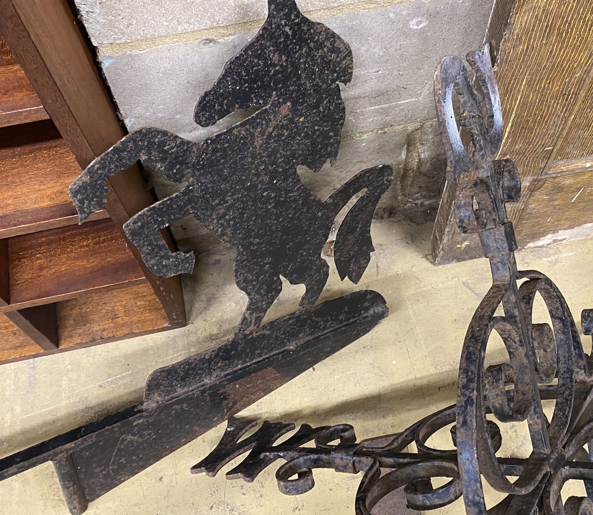 A wrought iron weather vane, width 90cm